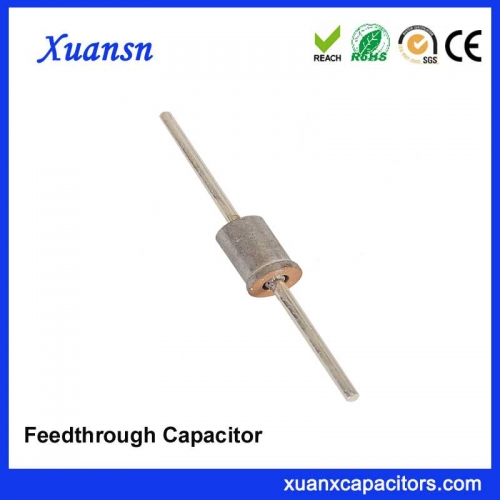 Welded ceramic feedthrough capacitor