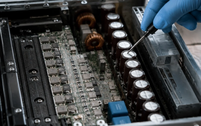 capacitors for ai server power supply - bulk aluminum electrolytic capacitors on an AI server PSU board